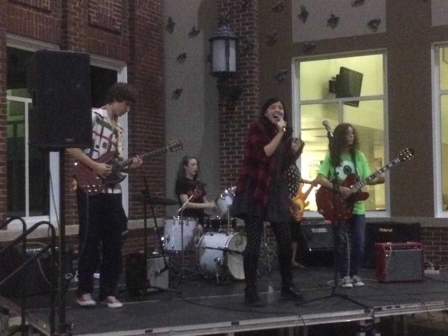 Members of the band Cherry 50 perform in the York Commons at a concert sponsored by Amateur Musicians and Mirrors to benefit Relay for Life.