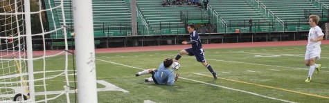 Cameron Markuson (1) dives for the ball to stop a goal.