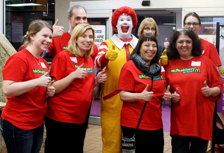 All teachers giving a thumbs up with Ronald McDonald.