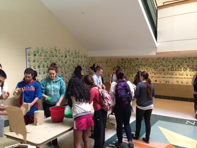 York+seniors+put+their+handprint+on+the+wall+in+the+North+Atrium+stairs.