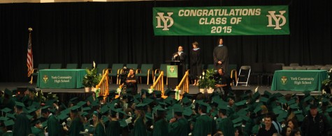 York Senior Class of 2015 rises to exit after the conclusion of their graduation ceremony.    