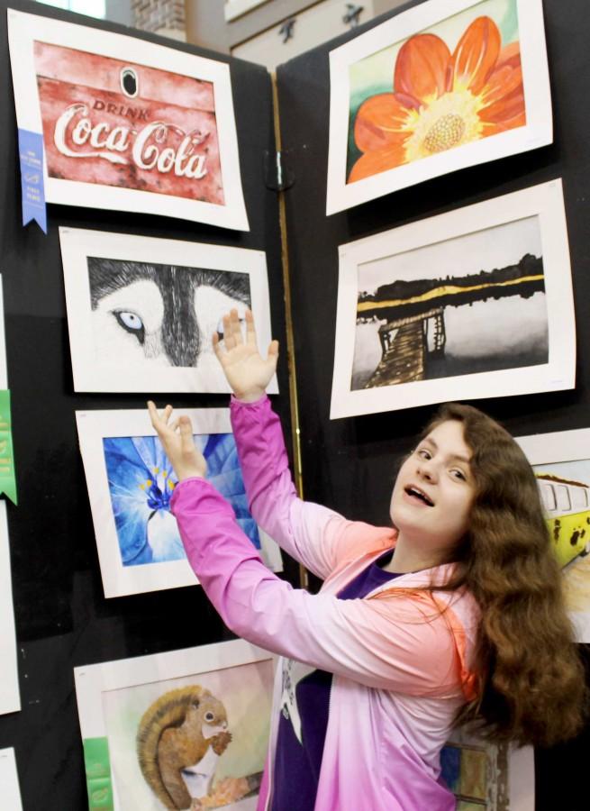 Kim Wittstock has been awarded 1st place for her portrait of a Coca Cola sign.