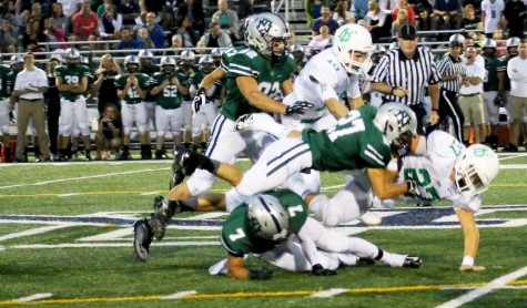 Connor Placey, 27, breaks through New Trier defensive line.
