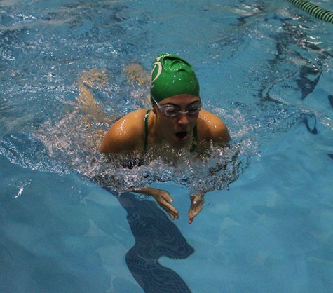 Amalia Siavelis reaches for the finish at the end of the 100 meter breaststroke.