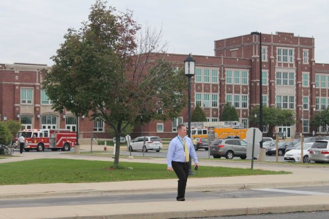Mr. McGuire manages the evacuation of the school.