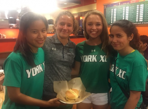 The York Girls’ Cross Country team competitors gracefully accepted defeat. Although having already eaten four of the six patties in the eat-off, Lezak bought the cross country burger to support the team. 