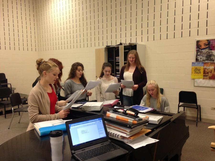 Sophomores in Choraliers rehearse their parts for their IMEA auditions.
