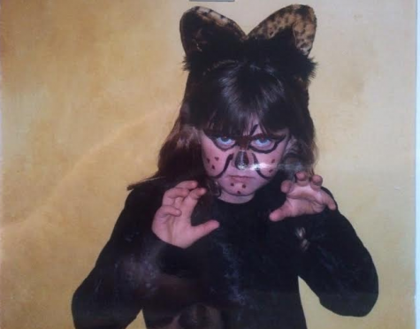 Ella Lee, York-Hi staff member, fiercely posed as a black cat. 