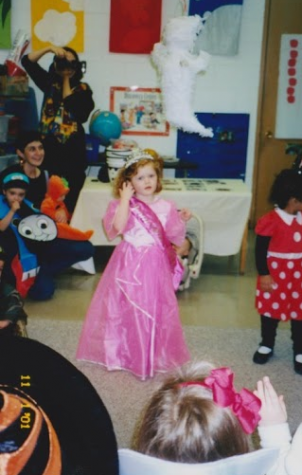 Senior York-Hi staff member Tess O'Brien struts as Prom Queen Barbie at her preschool Halloween party.