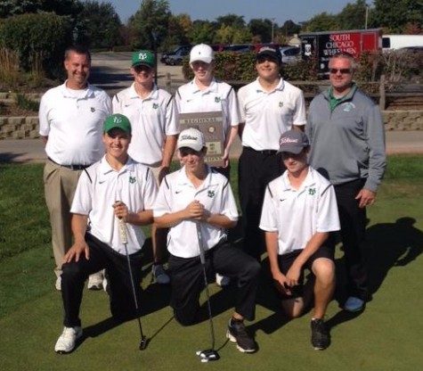 The Boys' Golf Team poses after regional victory. 