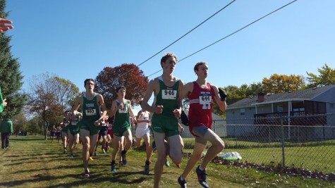 Charlie Kern (sophomore), Max Denning (senior) and Tommy Devereux (senior) approach the half mile point in the race.