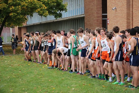 The competing teams line up before the start of the race.