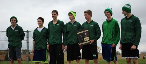 The boy's top seven runners accept their 1st place award. 