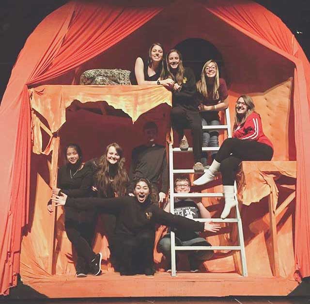 Costume crew, stage managers and set designers are seen posing in the giant peach! Photo courtesy of Becca Rogers