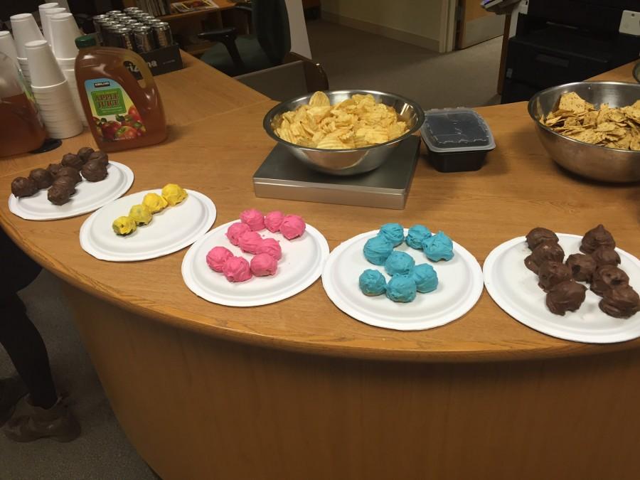 Cake balls happily spell out the Research in Social Science Honors acronym (RISSH) at the final Capstone Project. 