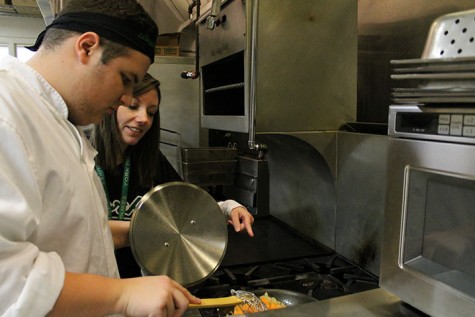 Senior Richard Incandela (left) and Foods teacher Wendy Albert (right) practicing for upcoming FCCLA competeition. 