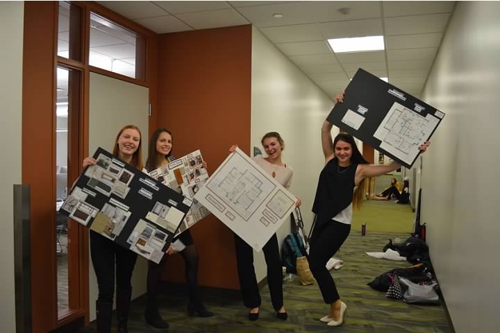 Interior Designers, from left to right, Allison Evans, Lauren Noonan, Kima Barannik, and Oksana Batryn competitors get excited to present their boards to the judges on Friday.