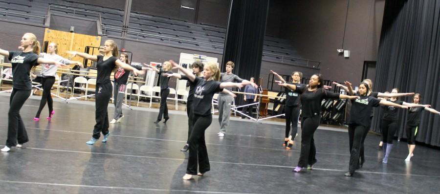 Advanced dance students rehearse their dance to David Bowies Fame.