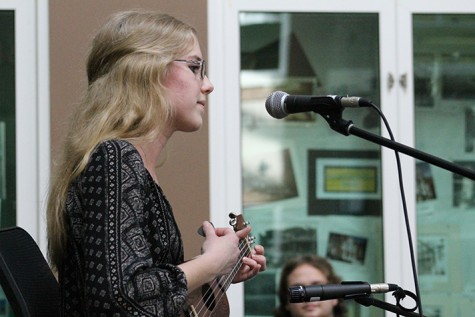 Tatum Langley plays her ukulele during open mic.