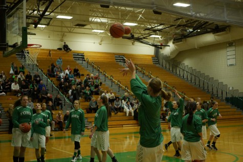 Rayanne Shockey warms up before the game. 