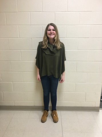 A light turtleneck is a great way to transition from your winter apparel to spring (Regina Hughes, sophomore).