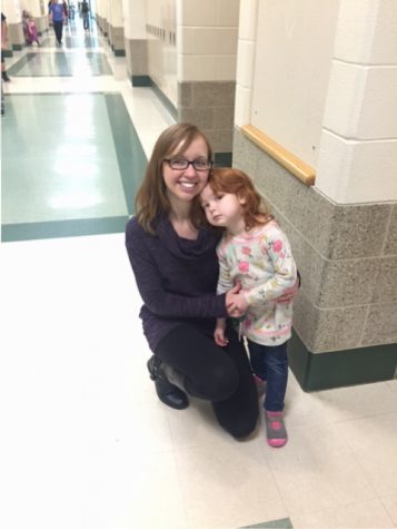 English teacher Mrs. Riley brought her daughter, Evelyn to school.