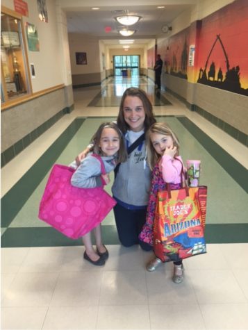 Social studies teacher Mrs. Trent brought her two girls to school.