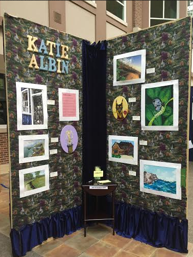 Katie Albins AP Art display in the commons is presented alongside other AP students displays.