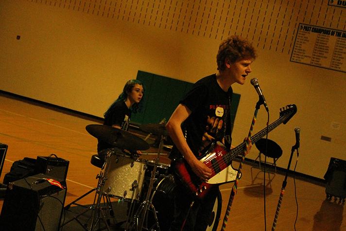 Sophomore, Becky Schéibl (left) and senior, Grant Mitchell (right) perform together as Squid Vicious at Night of Noise.