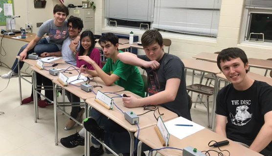 Scholastic Bowl team preparing for their match against the York faculty. (Not pictured: Ioan Draganov, Elisabeth Trenta). Photo courtesy of Andrew Bendelow.