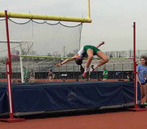 Morley high jumps in the Downers Grove South Triangular meet against Lyons Township and Downers Grove South.