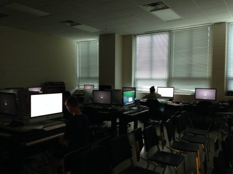 A Joey Alvestad (left) and Ali Gley (right) start their day in Music Production class.