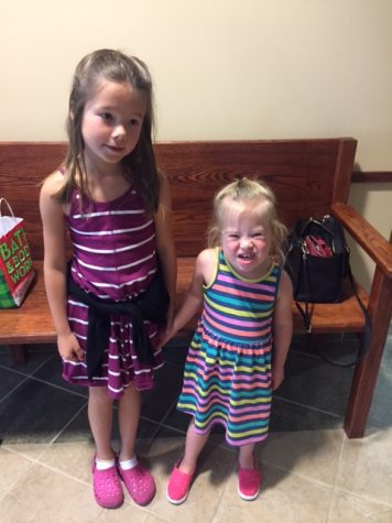Aubrey (age7) and Emma (age 4), Mrs. Deluga's daughters, keep her busy when she's not at York.
