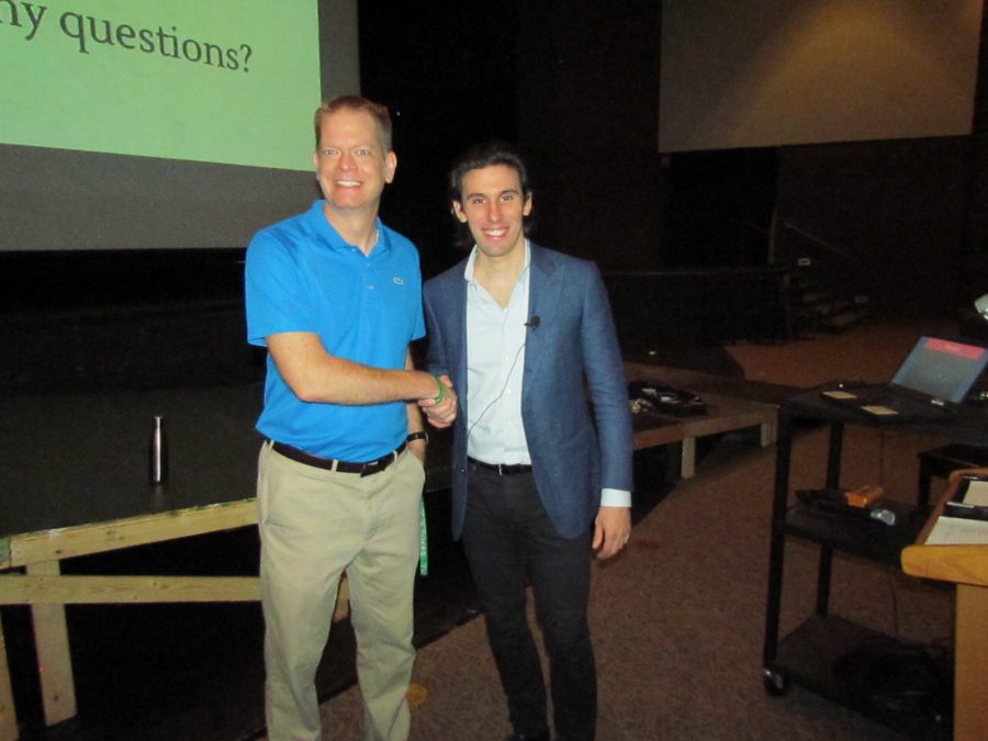 Mr. Dowdy and Mr. Perrino shaking hands after the presentation, 2nd period