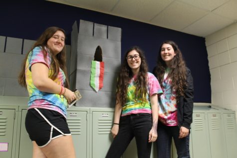 Italian Club takes up both sides of the hallway as members of various grades work together to finish their 3D hallway art. 