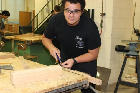 "I took this class because I enjoy woodworking and I enjoy working with tools. Right now we are all making different tables. I am making an end table which I am going to put in my family room. I'll probably put a lamp, coffee, and some good books on it. Yeah....I read a lot of books."