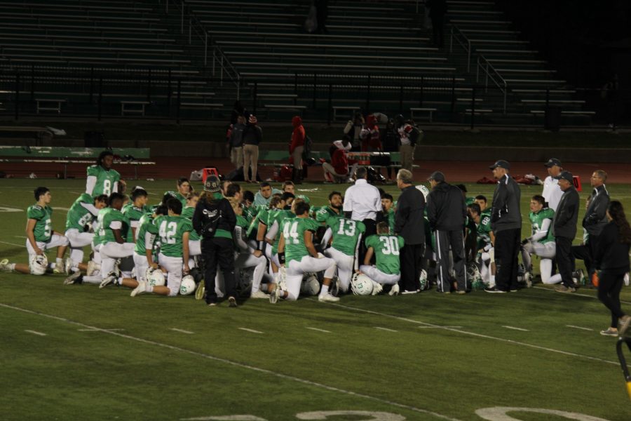 The team gathers after the game. 