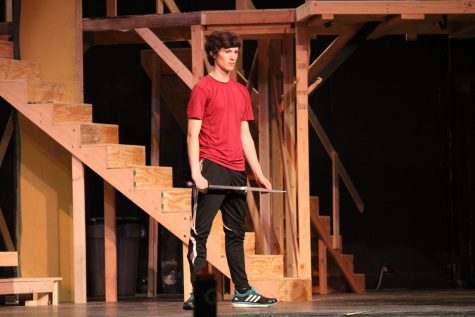 Griffin holds the sword his character Tybalt uses as he receives direction from Orion. 