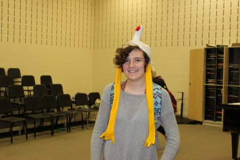 Junior Eileen King shows her excitement for Halloween by wearing a chicken hat to school.