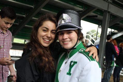 Carina Kanzler (sophomore) greets her friend Olivia Braun (sophomore) before the festival. 