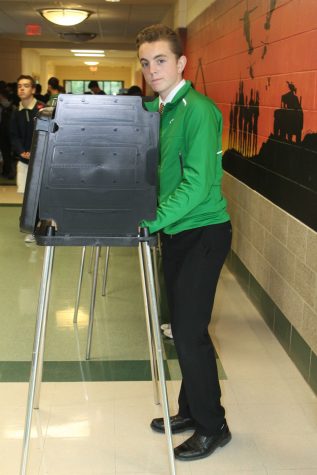 Freshman Sean Solemn casts his vote in Thursday's mock election. Oct. 6, 2016.