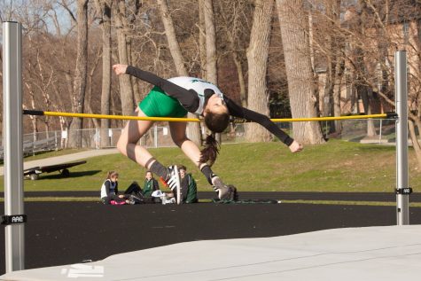 Jeanette Morley clears the high bar. In her junior season, Morley broke York's record for jumping 5'10".