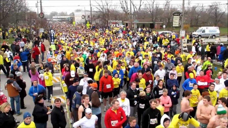 Participants run on York road in the 2011 Turkey Trot. Photo courtesy of Youtube.