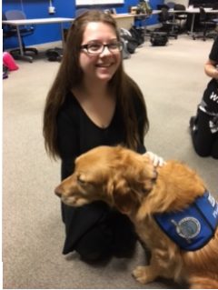 Maggie Knopf, sophomore, poses with Luther.