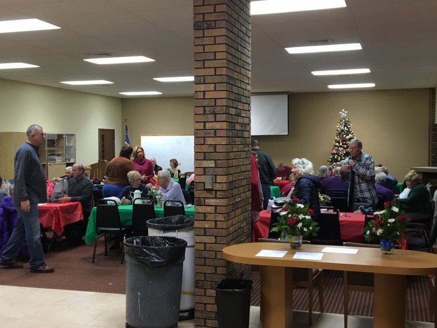 The Grace Café community gathers together for a meal at Redeemer Lutheran Church on December 5.