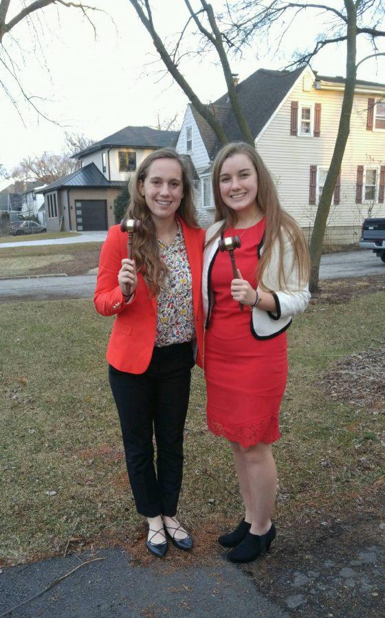Juniors (from left to right) Julia Johnson and Cambria Khayat hold up their gavel awards after the LYMUN conference. 