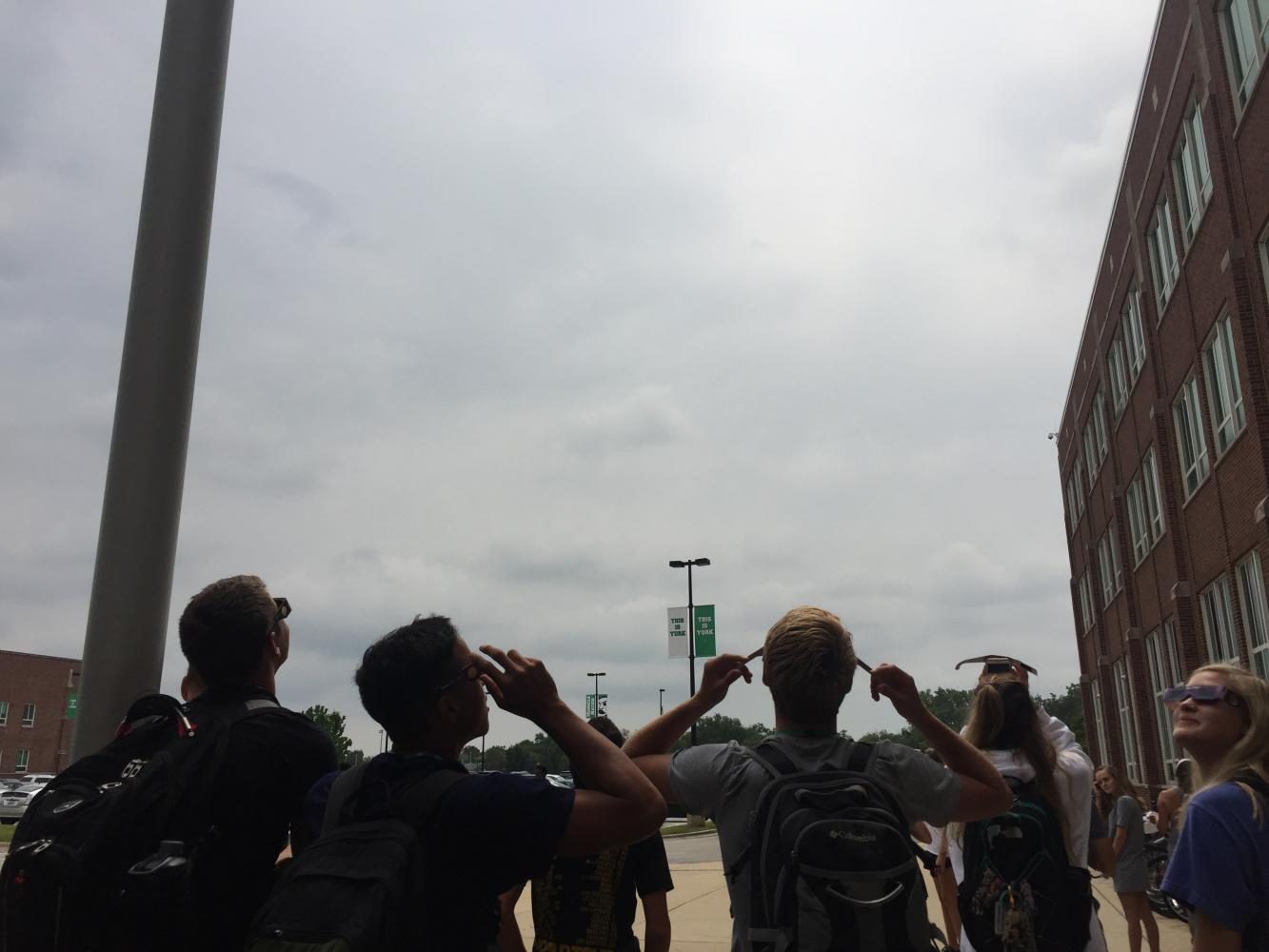 Clouds+block+the+students+view+of+the+solar+eclipse+during+6th+period.