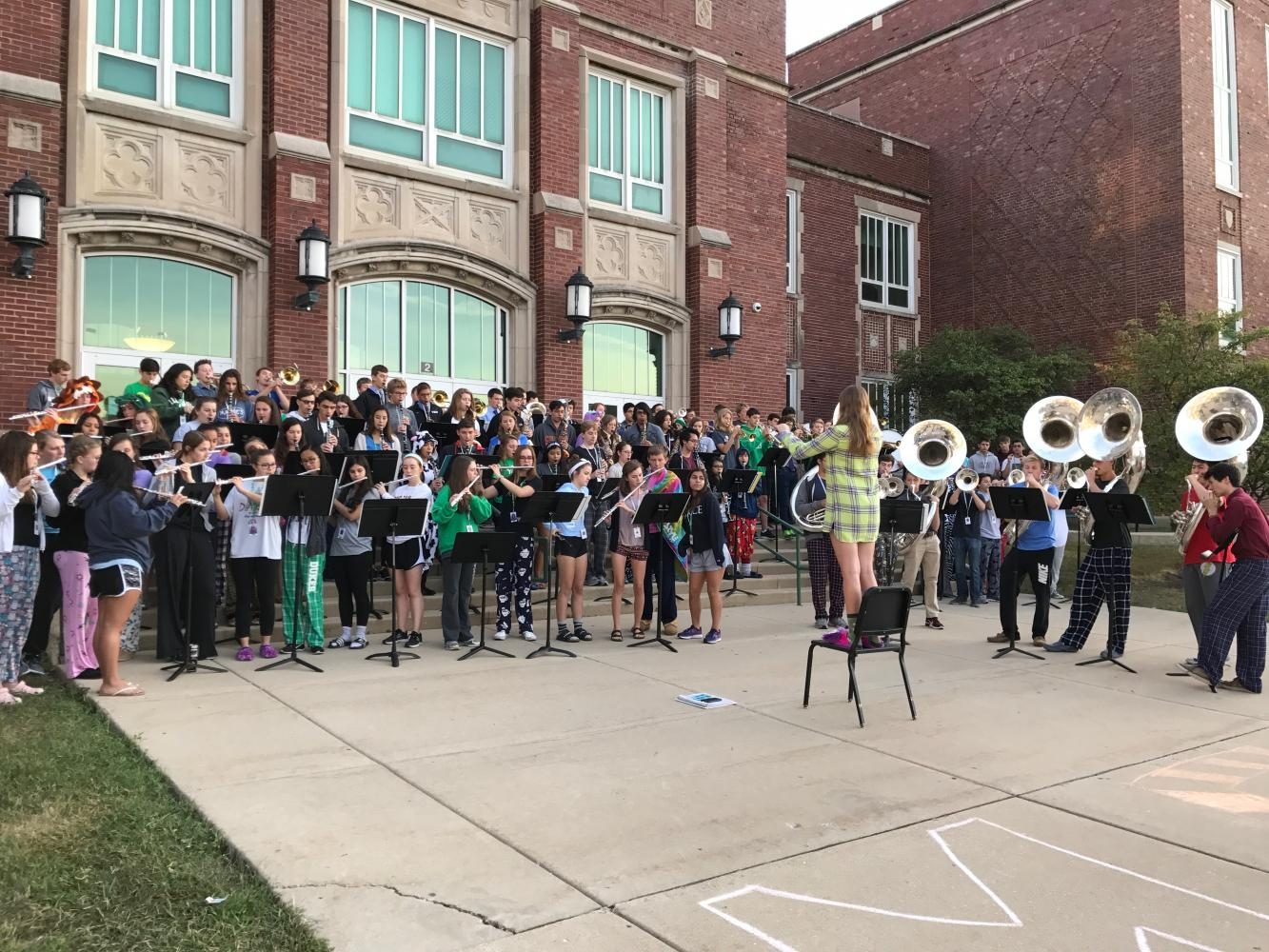 The York marching band plays in front of the school Monday to kick off Homecoming week. 