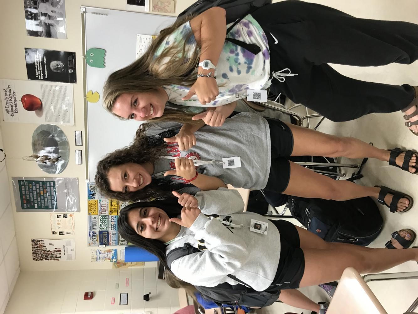 Sophomores Natalie Rinchiuso, Amanda Polach, and Cara McGovern participate in pajama day as apart of homecoming week.