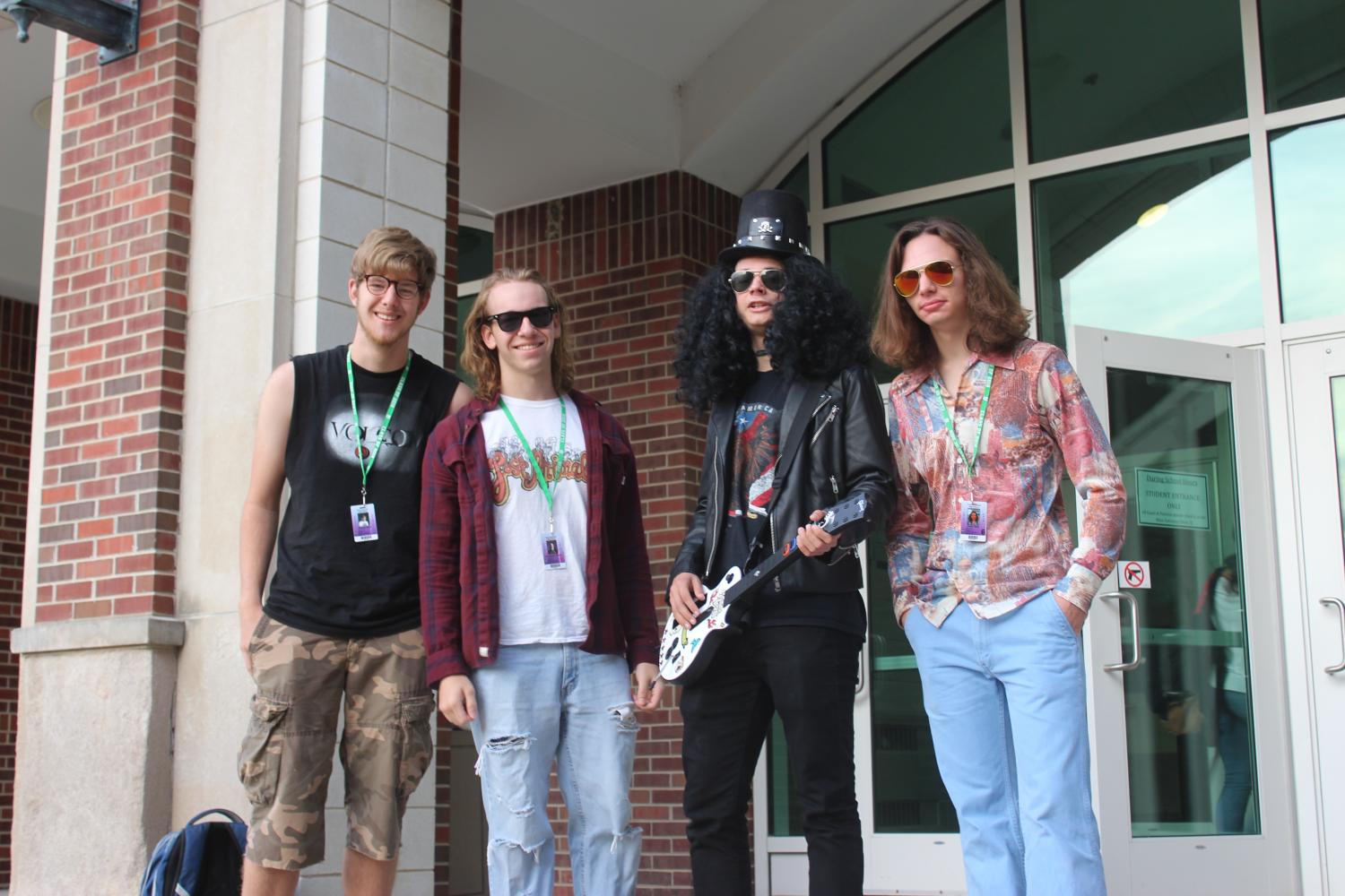 King of the Couch group Smells Like Duke Spirit, consisting of (from left) Michael Ryan, Chris Rieger, Clay Lynam and Julian Race, rock n rolls out Duke pride with their music inspired outfits. 